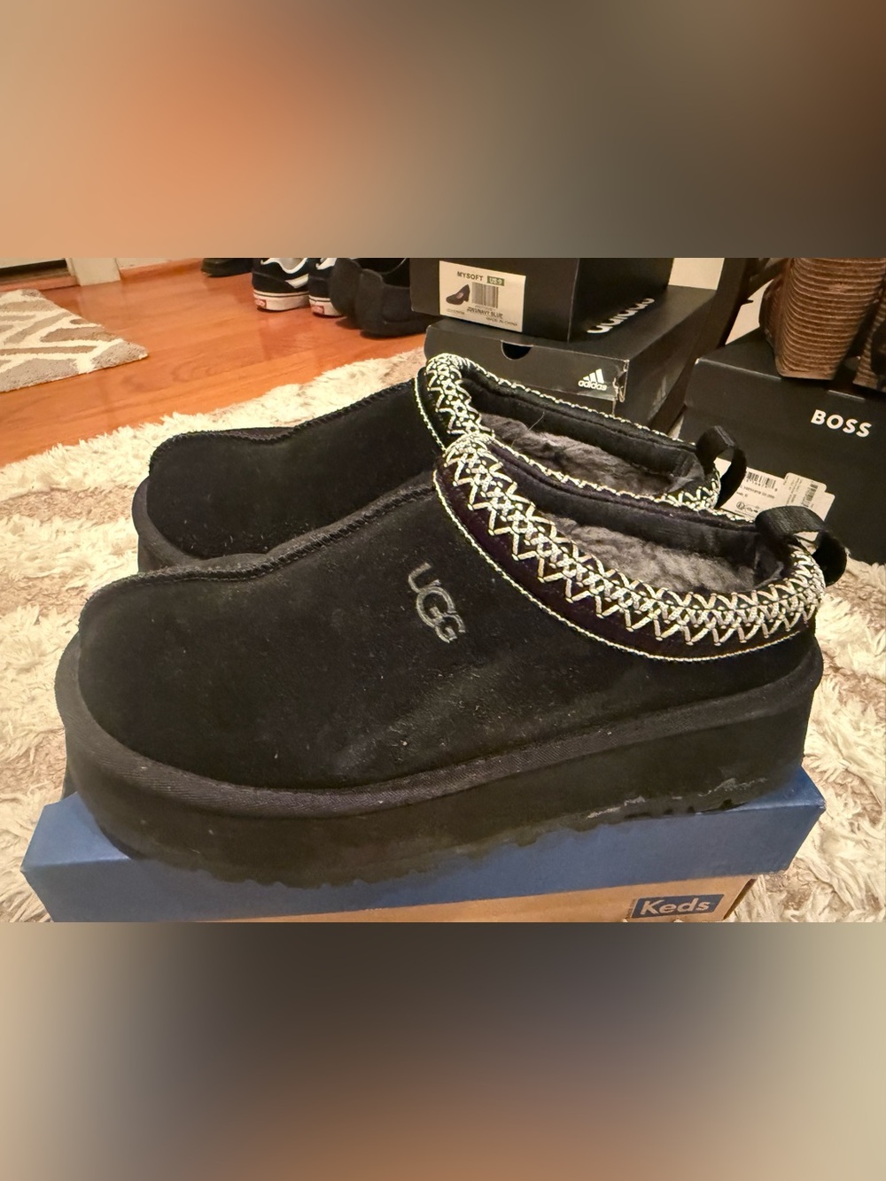 UGG women’s Black Suede Slip-On Clog with Embroidered Trim